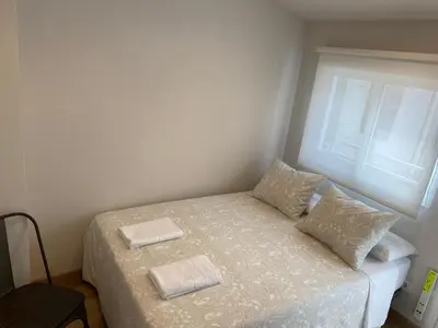Cama o camas de una habitación en Fuencarral Apartments