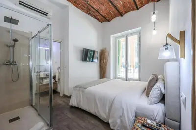 Cama o camas de una habitación en Puerta del Sol Apartamento economico