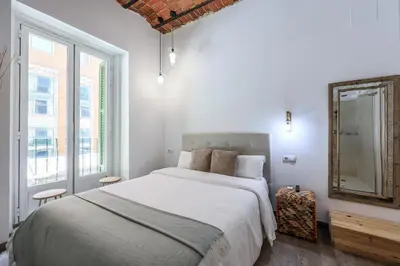 Cama o camas de una habitación en Puerta del Sol Apartamento economico
