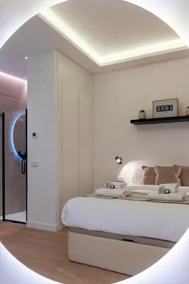 Cama o camas de una habitación en Apartamento de Diseño Puerta del Sol
