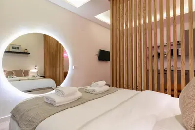 Cama o camas de una habitación en Apartamento de Diseño Puerta del Sol
