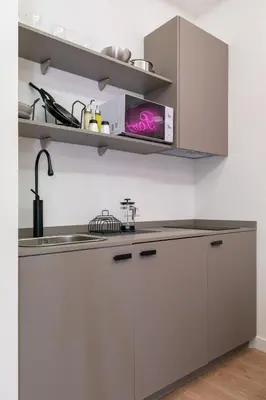 Una cocina o zona de cocina en Apartamento de Diseño Puerta del Sol