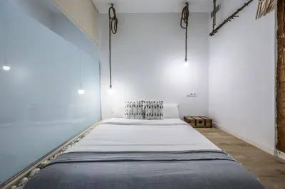 Cama o camas de una habitación en AmazINN Places Madrid Preciados