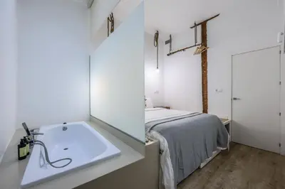 Cama o camas de una habitación en AmazINN Places Madrid Preciados