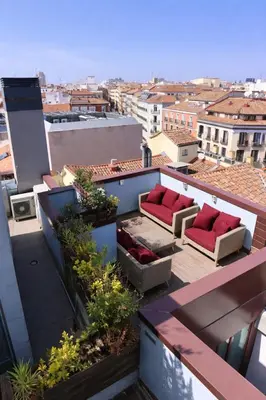 Zona de estar de Apartamentos Libertad 24