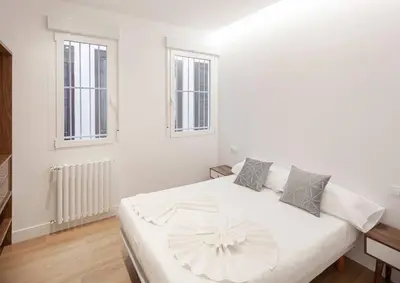 Cama o camas de una habitación en Malasaña I calle Churruca 2BR 2BH