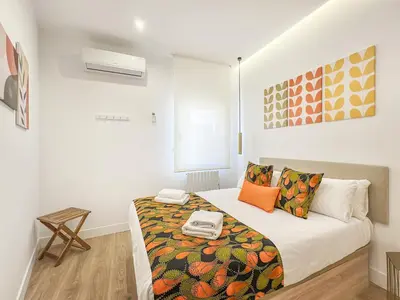 Cama o camas de una habitación en Piso Amplio 2H/2B Plaza de España Berlany España