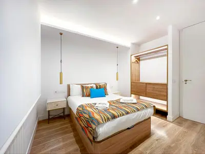 Cama o camas de una habitación en Piso al lado de Gran Vía 2H/2B Berlany España