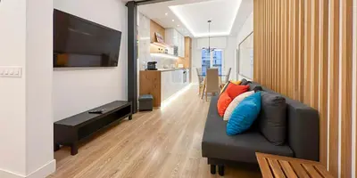 Una televisión o centro de entretenimiento en Piso al lado de Gran Vía 2H/2B Berlany España