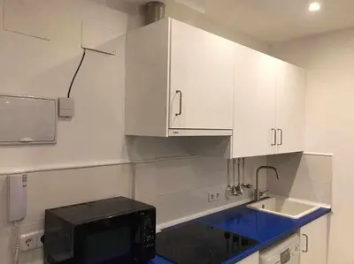 Una cocina o zona de cocina en Un genial estudio en el barrio las cortes