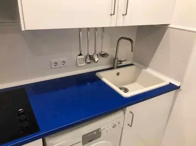 Una cocina o zona de cocina en Un genial estudio en el barrio las cortes
