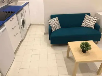Una cocina o zona de cocina en Un genial estudio en el barrio las cortes