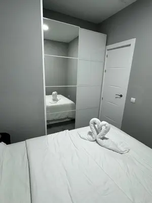 Cama o camas de una habitación en Encanto Santiago Bernabéu- Apartamento CASTELLANA