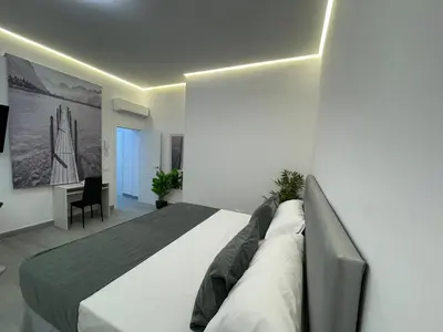 Cama o camas de una habitación en SUARA LOFT APARTAMENTOS