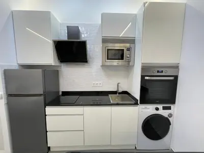 Una cocina o zona de cocina en SUARA LOFT APARTAMENTOS