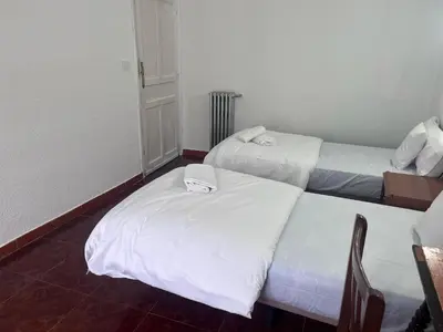 Cama o camas de una habitación en Hostal Alonso No Limit Madrid