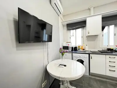 Una cocina o zona de cocina en Encantador Madrid Val Der Temporal