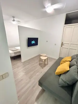 Una televisión o centro de entretenimiento en Studio Sol Villa