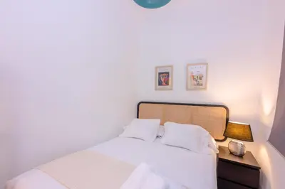 Cama o camas de una habitación en For Your Rentals Título Moderno y elegante apartamento TEMPORAL en barrio Ibiza MEN300