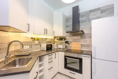 Una cocina o zona de cocina en For Your Rentals Título Moderno y elegante apartamento TEMPORAL en barrio Ibiza MEN300