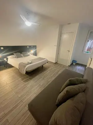 Cama o camas de una habitación en Arce habitaciones