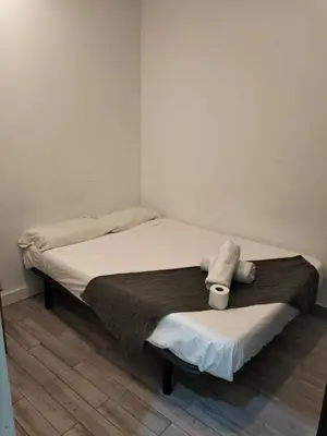 Cama o camas de una habitación en Arce habitaciones