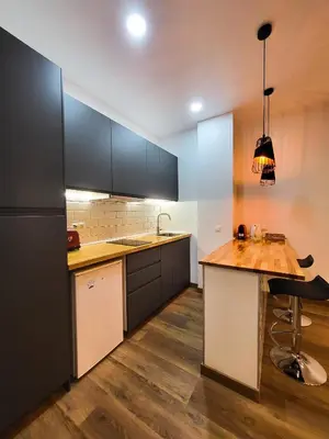 Una cocina o zona de cocina en Precioso estudio con dos ambientes