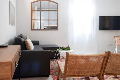 Una televisión o centro de entretenimiento en Apartamento en Sol centro ciudad