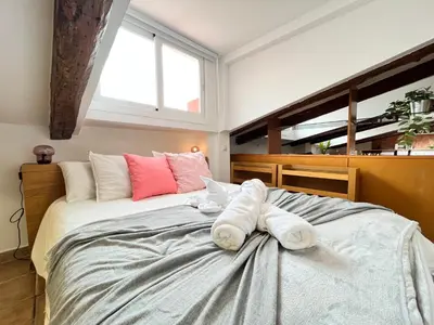 Cama o camas de una habitación en Atico Atocha Ile Temporal
