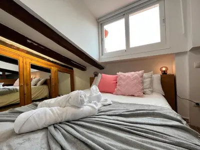 Cama o camas de una habitación en Atico Atocha Ile Temporal