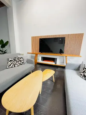 Una televisión o centro de entretenimiento en Carretas dúplex exterior izquierda