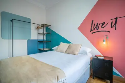 Cama o camas de una habitación en Live It Madrid Chamberi