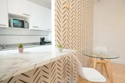 Una cocina o zona de cocina en Live It Madrid Chamberi