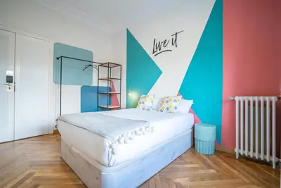 Cama o camas de una habitación en Live It Madrid Chamberi