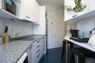 Una cocina o zona de cocina en Live It Madrid Chamberi