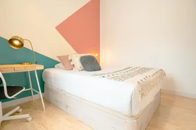 Cama o camas de una habitación en Live It Madrid Chamberi