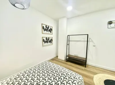 Cama o camas de una habitación en Madrid Rio Amparo Usera