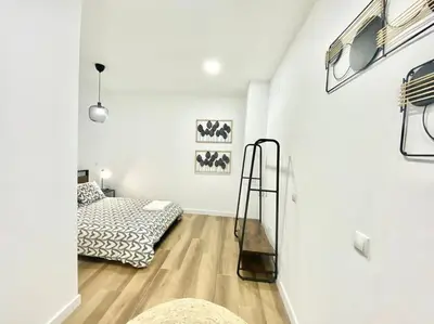 Cama o camas de una habitación en Madrid Rio Amparo Usera