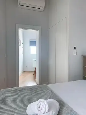 Cama o camas de una habitación en Barrio de las Letras - Buhardilla en el Centro