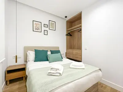 Cama o camas de una habitación en Piso Moderno 2H/2B Barrio Salamanca Berlany España