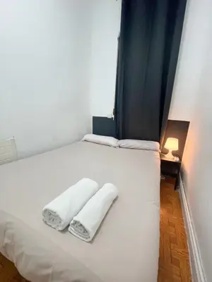 Cama o camas de una habitación en Toledo habitaciones