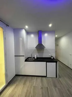 Una cocina o zona de cocina en Acogedor apartamento en Gran Vía