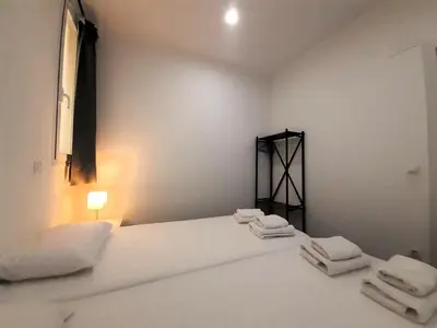 Cama o camas de una habitación en Acogedor apartamento en Gran Vía