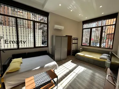 Cama o camas de una habitación en Estudio céntrico zona palacio
