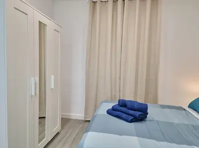 Cama o camas de una habitación en Apartamentos Bielsa 'Madrid Río'