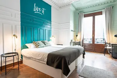 Cama o camas de una habitación en Live it Madrid Gran Vía