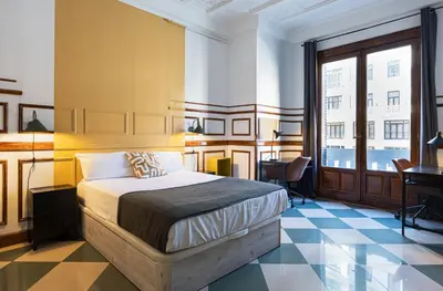 Cama o camas de una habitación en Live it Madrid Gran Vía