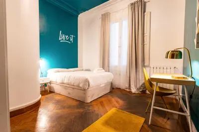 Cama o camas de una habitación en Live it Madrid Gran Vía