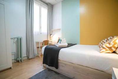 Cama o camas de una habitación en Live it Madrid Gran Vía