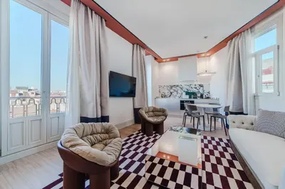 Una televisión o centro de entretenimiento en Apartamentos Soho Boutique Hoy No Me Puedo Levantar